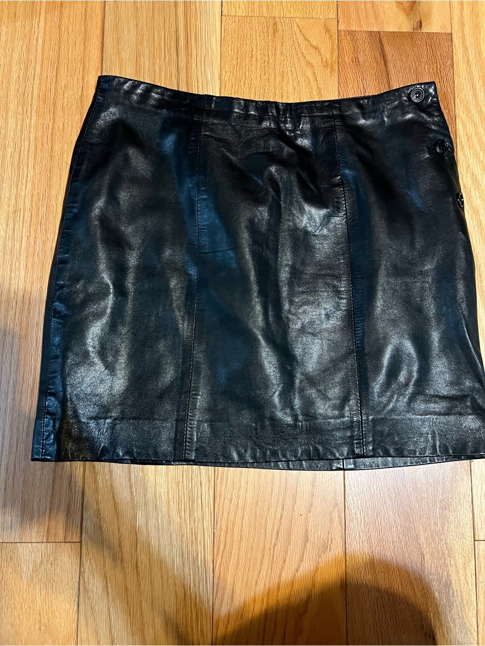 Sleek Black Leather Nuance Mini Skirt -